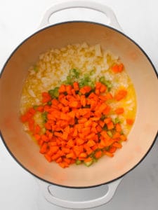 Mirepoix in a large Dutch oven pot.