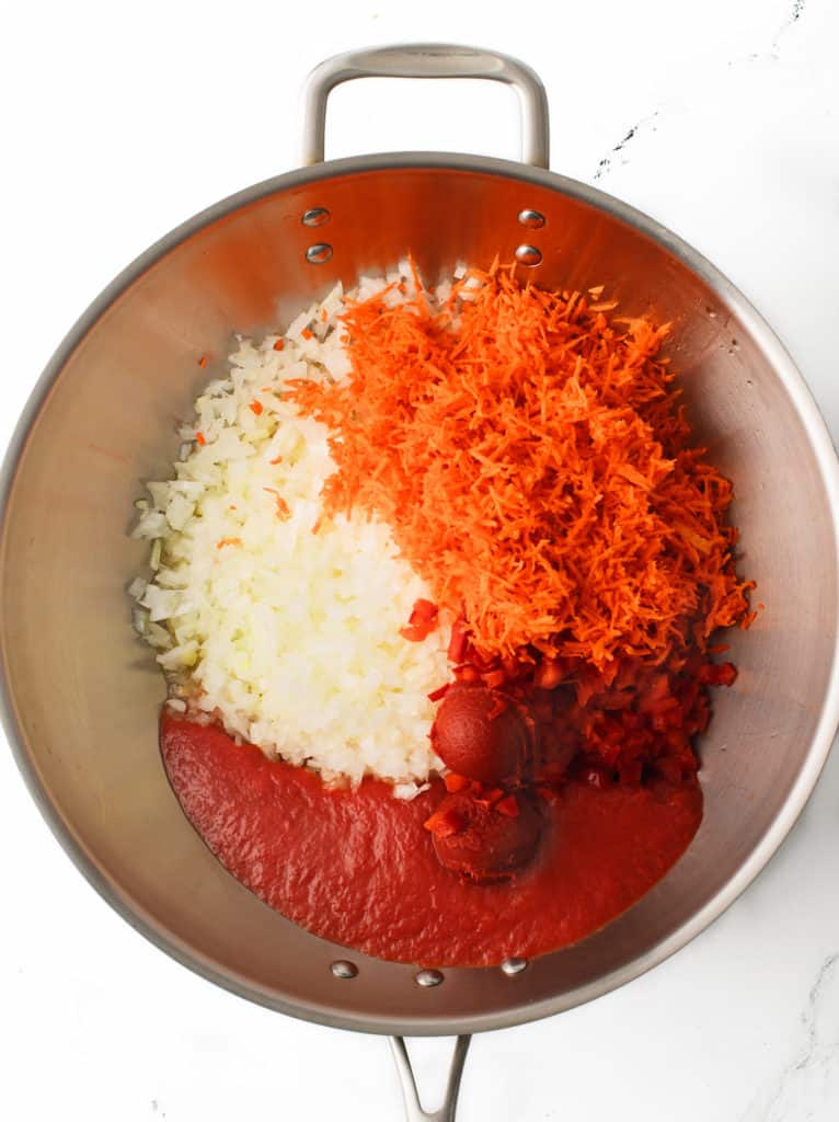 Mirepoix cooking in skillet.