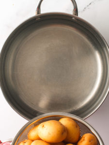 Boiling potatoes in large pot.