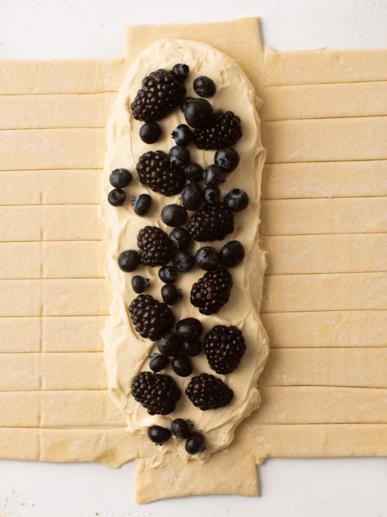 Puff pastry with berry and cream filling.