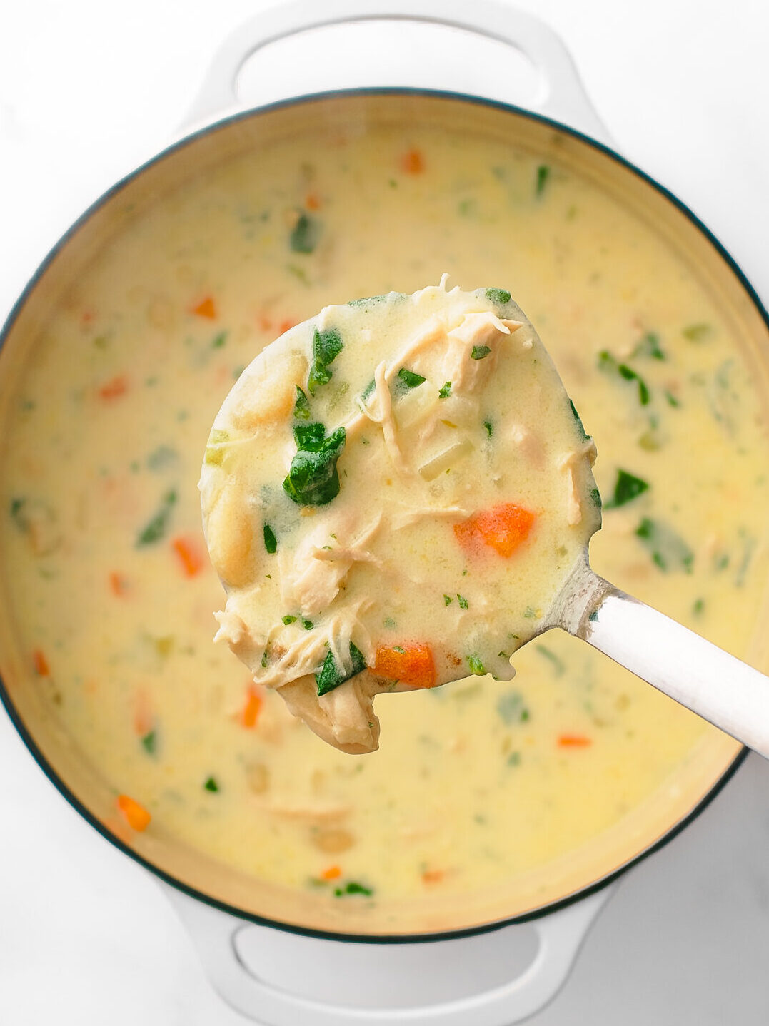 Cooked creamy soup in a large pot.