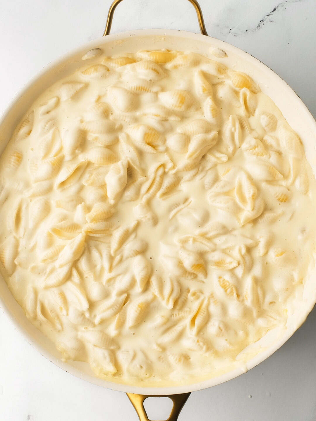 Creamy Alfredo Sauce in pan.