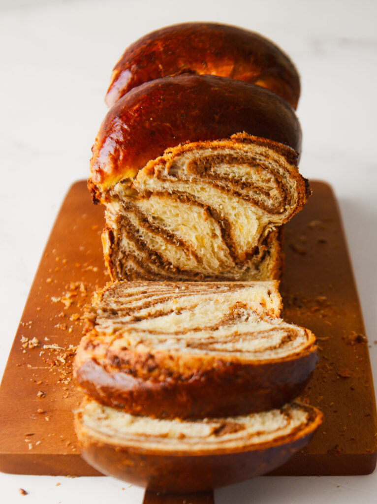 Cozonac Babka loaf with center filling exposed.