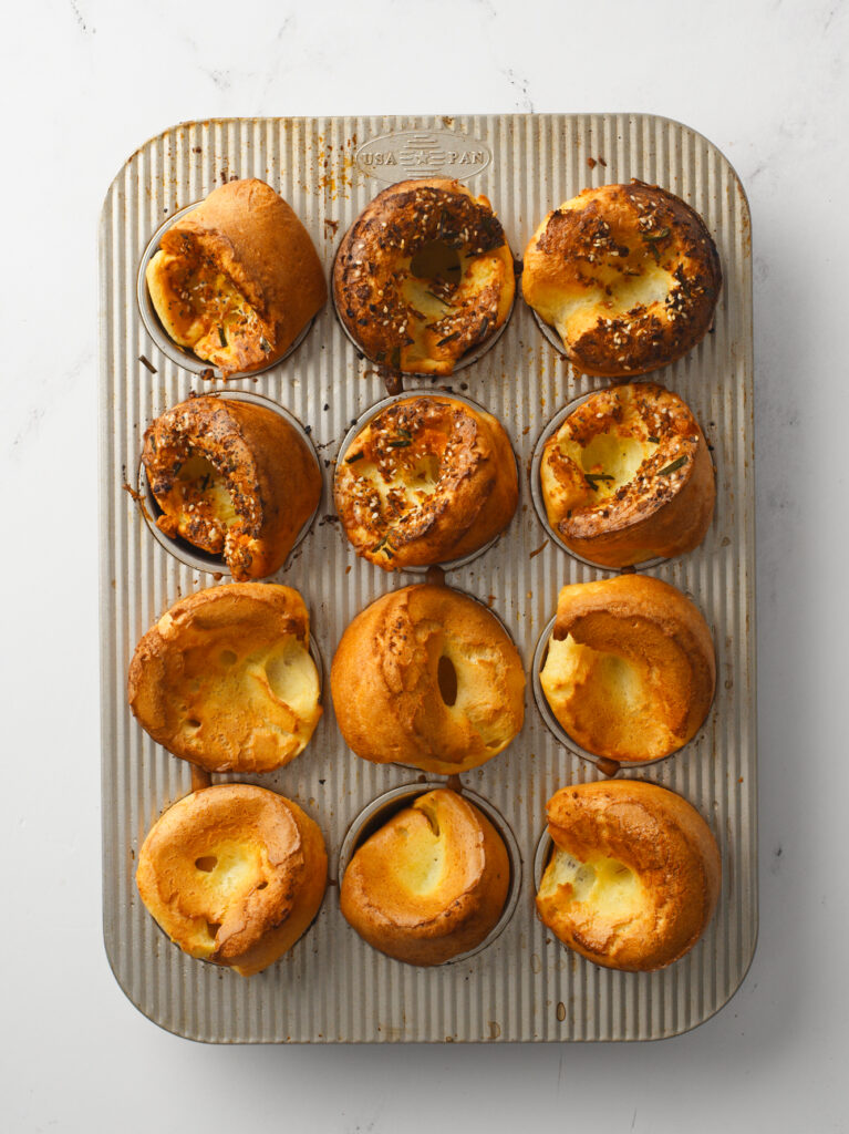 Popovers baked and puffed in muffin pan.