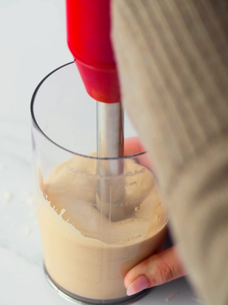 Blending salad dressing using emulsion blender.