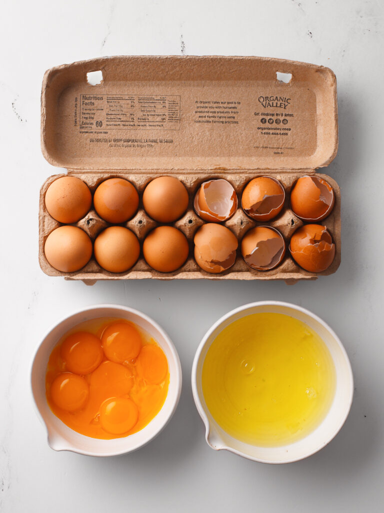 Separating the egg yolks and egg whites.