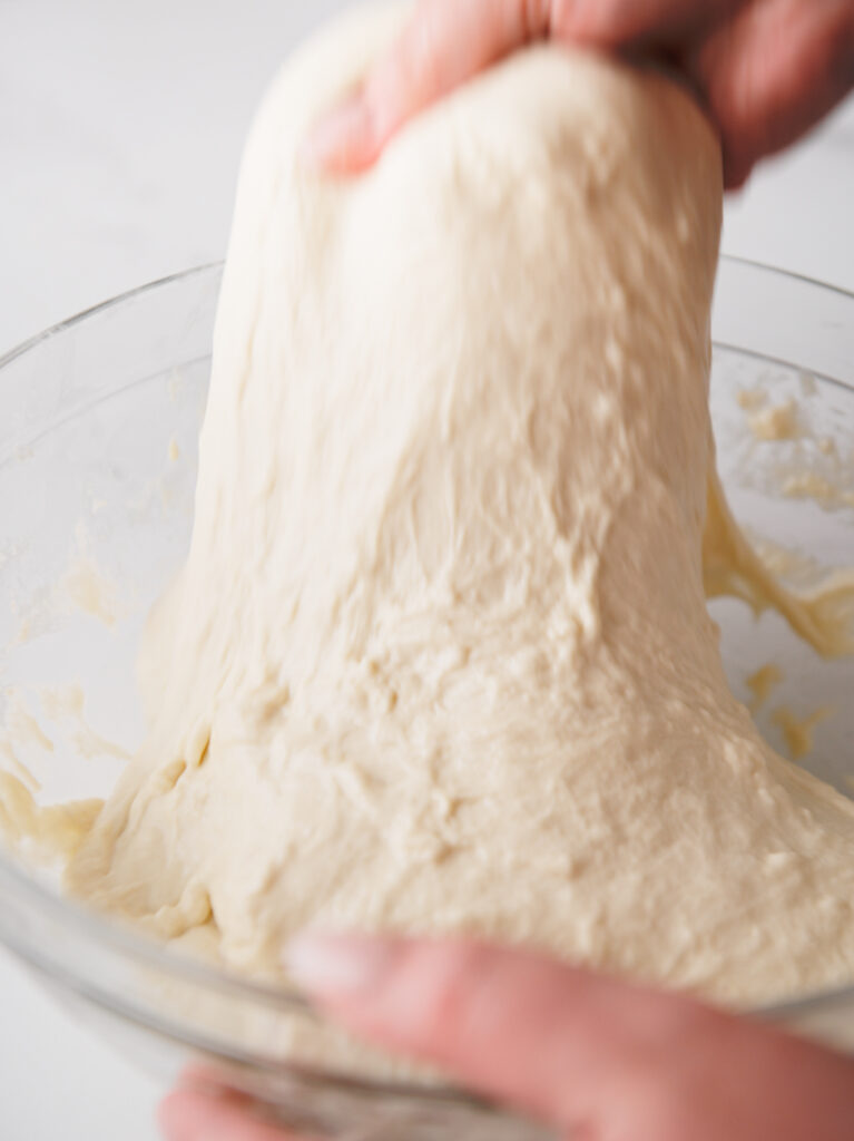 Stretch and fold the soft dough.