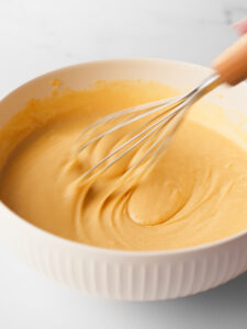 Whisking the batter together.