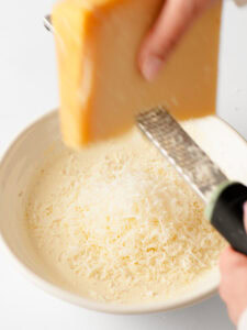 Freshly grated parmesan to the creamy dressing.