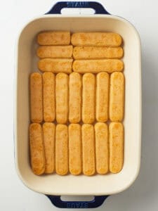 Lady fingers arranged in a single layer.