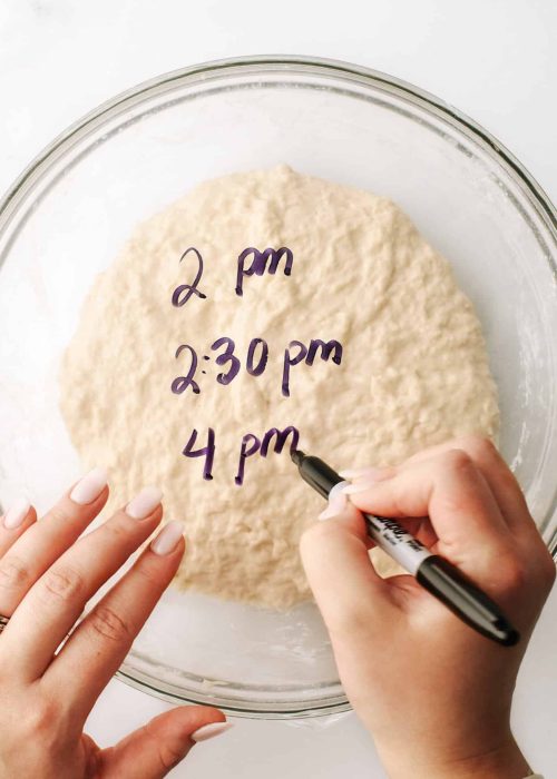Writing on plastic wrap times for dough proofing.